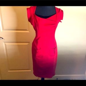 Necessary Objects: fitting red dress